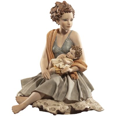 Figurine en porcelaine sur la maternité : Berceuse