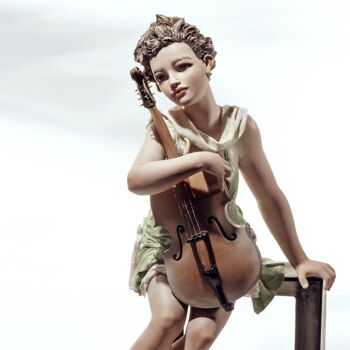 Suite statue en porcelaine, femme au violoncelle 2