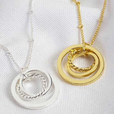 Gold Mixed sizes interlocking ring necklace