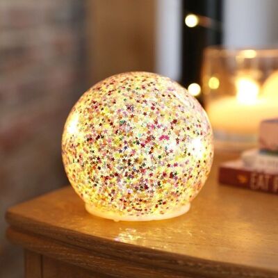 Piccolo globo luminoso a LED con glitter arcobaleno