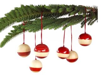 Boules de Noël en bois rouge - Fond à rayures lumineuses