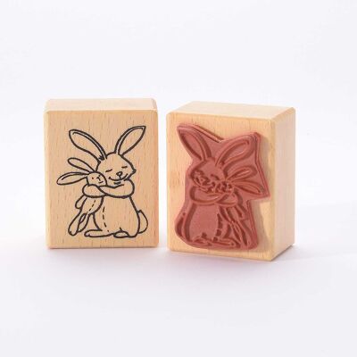 Titolo del francobollo con motivo: Teneri coniglietti