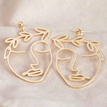 Boucles d'oreilles pendantes visage feuille de laurier en or 2