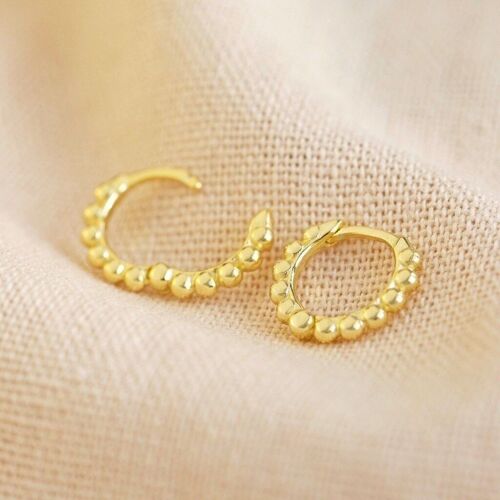 Sterling Silver Dotted huggie earring in Gold