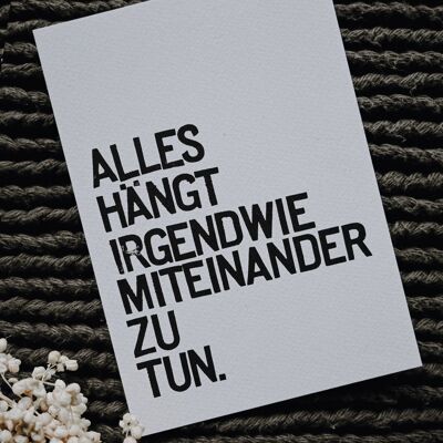 Gestempelte Postkarte "Alles hängt miteinander zu tun"