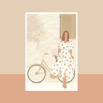 La mujer con una tarjeta de bicicleta.