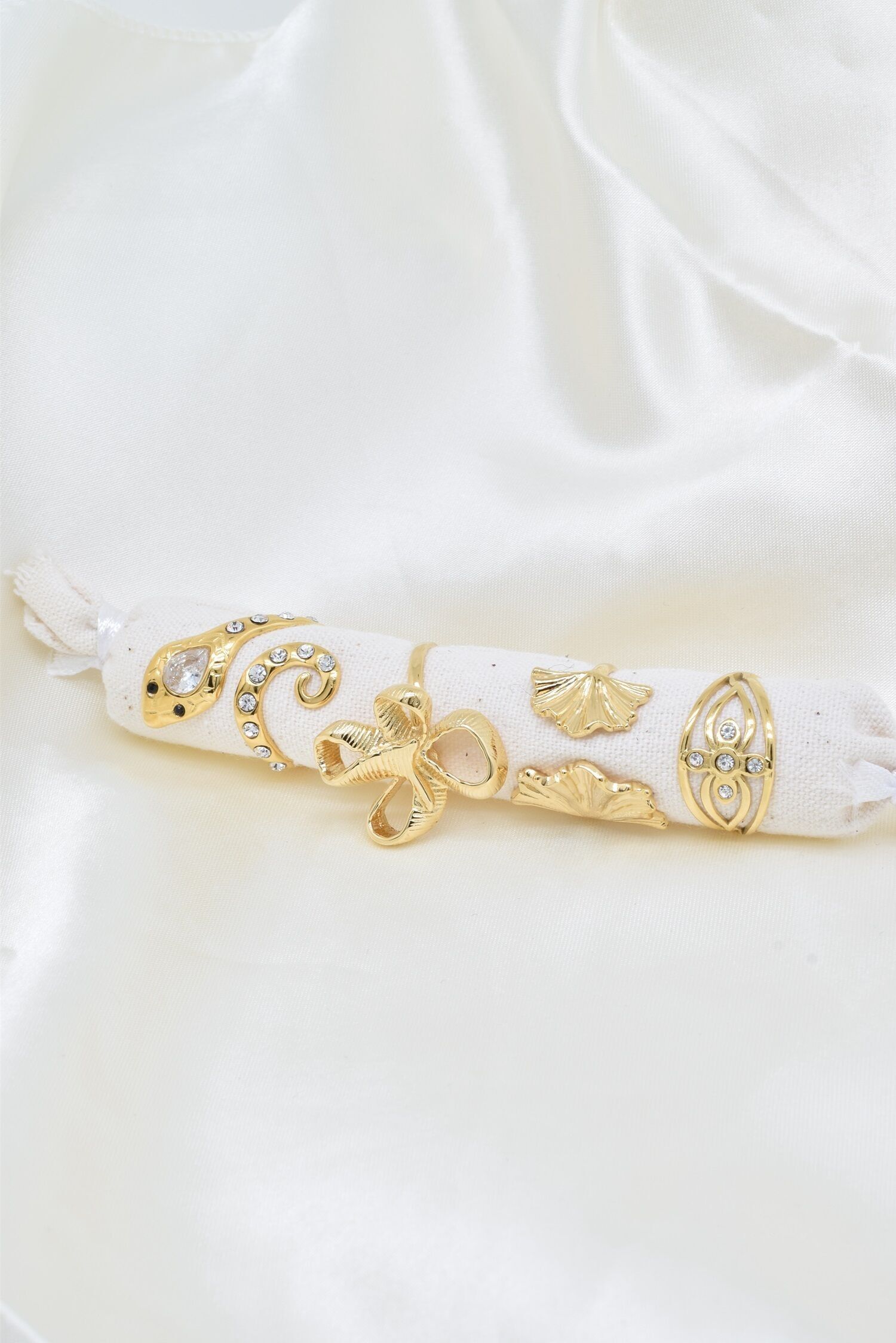 Set di 4 anelli regolabili in acciaio dorato - PR009BG-OR