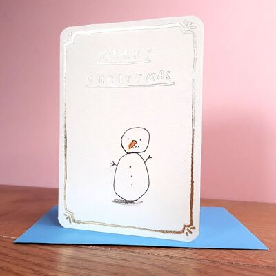 Cartolina di Natale con pupazzo di neve dorato