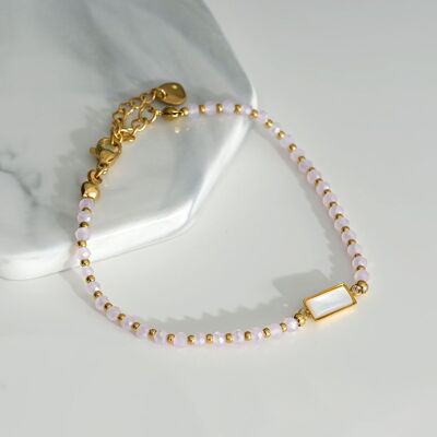 Pulsera de oro con piedra rosa