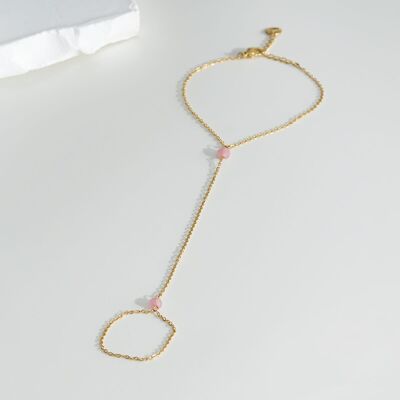 Bracciale ad anello a catena dorata con due cristalli rosa