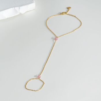 Bracelet bague chaîne dorée avec deux cristaux roses