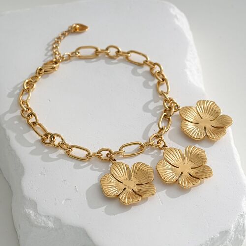 Bracelet chaîne doré avec trois fleurs pendantes