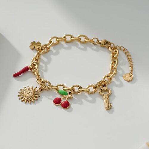 Bracelet doré avec multi pendentifs soleil et cerise