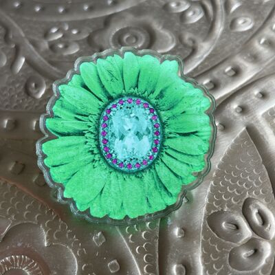 Anstecknadel aus recyceltem Acryl. Grüne Gerbera-Blume