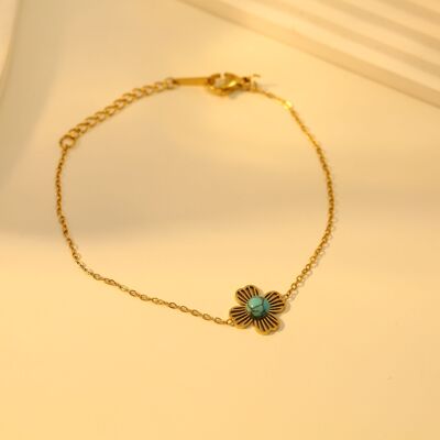 Bracelet doré fin avec trèfle et pierre turquoise
