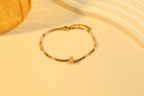 Bracelet doré avec pierre nature rose