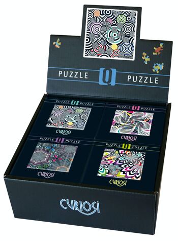 Boîte de présentation Q7-Shake remplie de 16 puzzles de la série Q-Shake, 70 / 72 pièces de puzzle