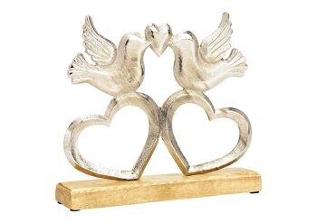 Oiseau debout sur coeur, sur socle en bois de manguier, en métal argenté (L/H/P) 25x22x5cm