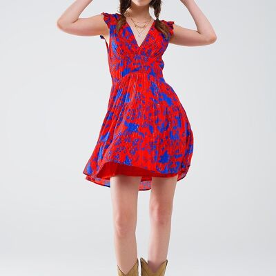 Robe courte rouge avec imprimé floral bleu et col en V