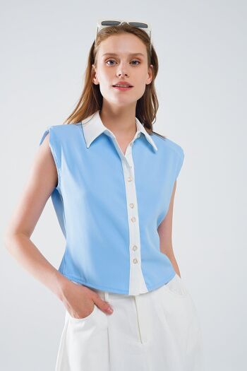 Chemise bleue avec coutures blanches et fermeture boutonnée 5