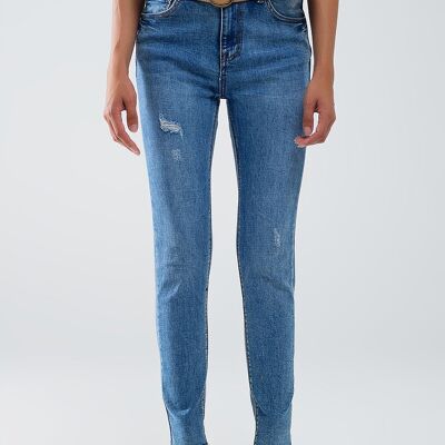 Jeans super skinny in denim elasticizzato con lavaggio medio con dettagli effetto consumato