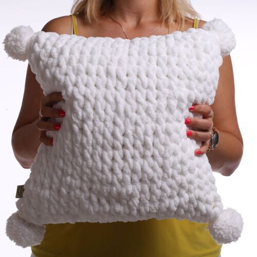 White pom poms hand knit pillow