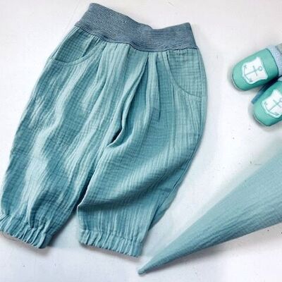 Pantaloni Janni in mussola di colore verde menta, con due tasche ed elastico in vita, perfetti per l'estate