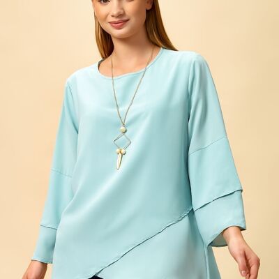 Top a strati asimmetrico oversize in celeste