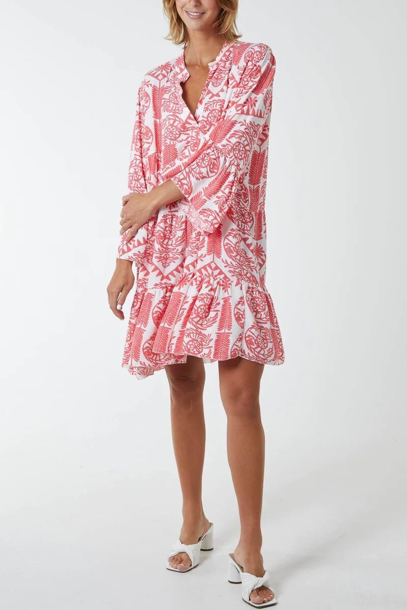 Abito grembiule stampato oversize a maniche lunghe in arancione