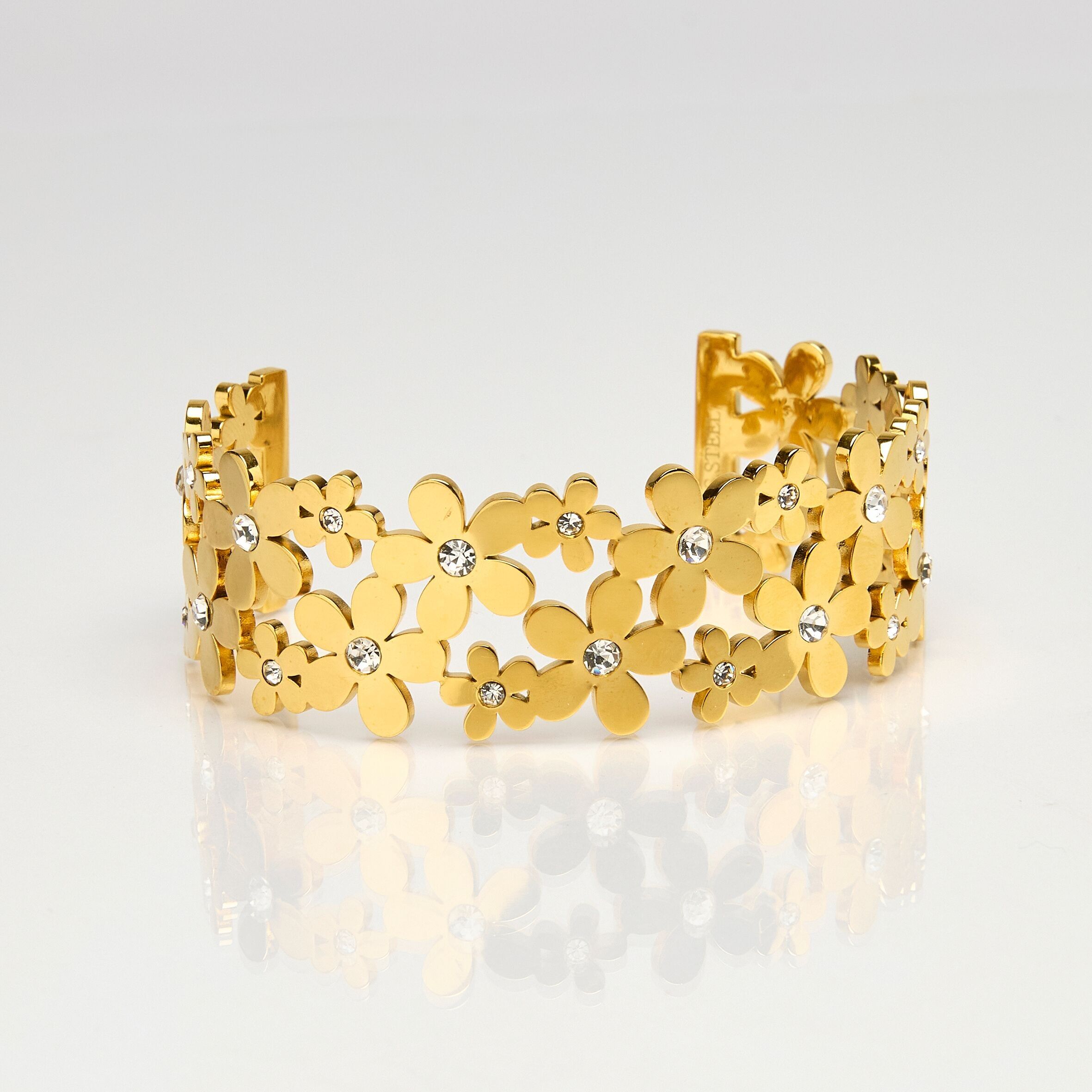 Bracciale in acciaio inossidabile dorato, floreale, strass.