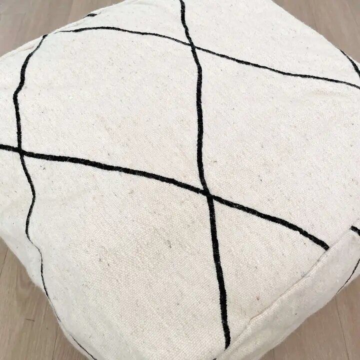 Pouf en laine noir et blanc