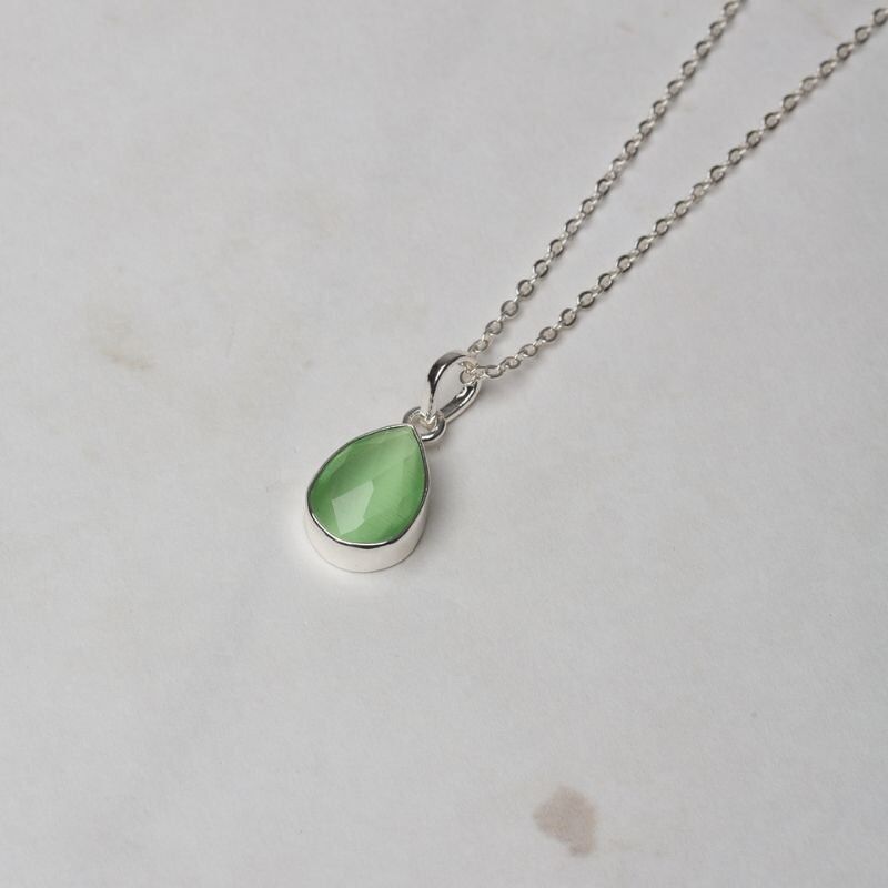 Cimacio Anhänger aus poliertem Silber in Hellgrün