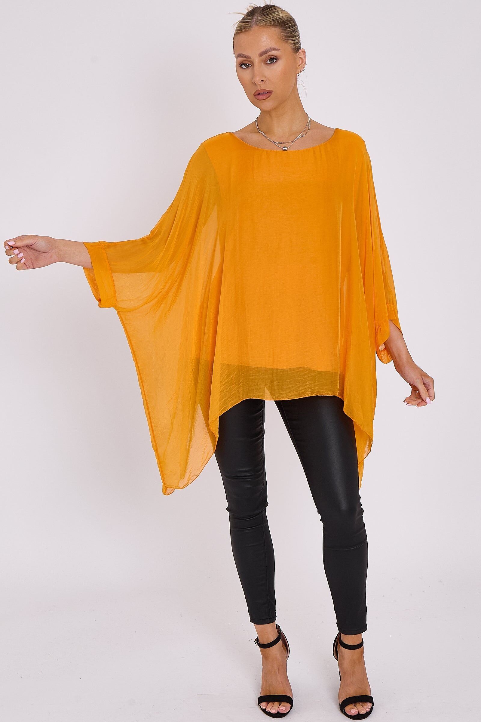 Blusa in seta arancione con maniche a pipistrello