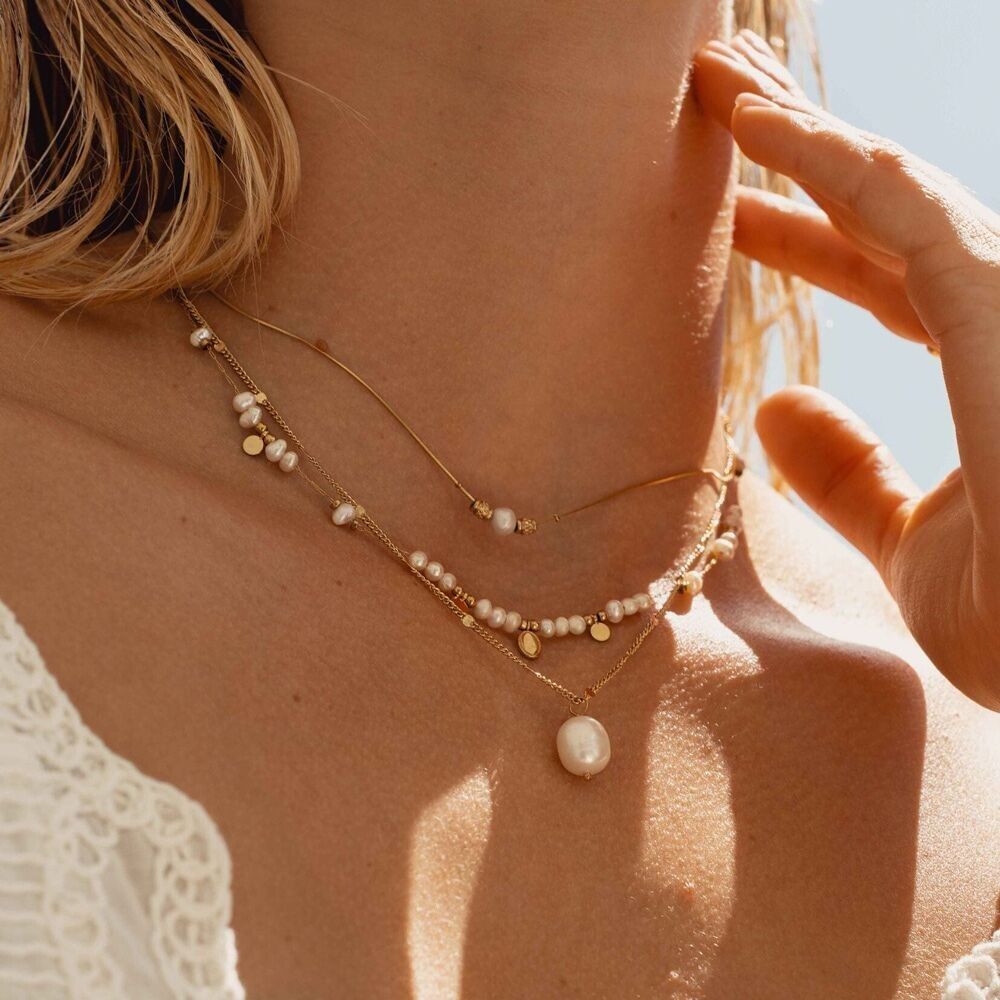 Daniela-Halskette – ovale und runde Quasten mit Süßwasserperlen