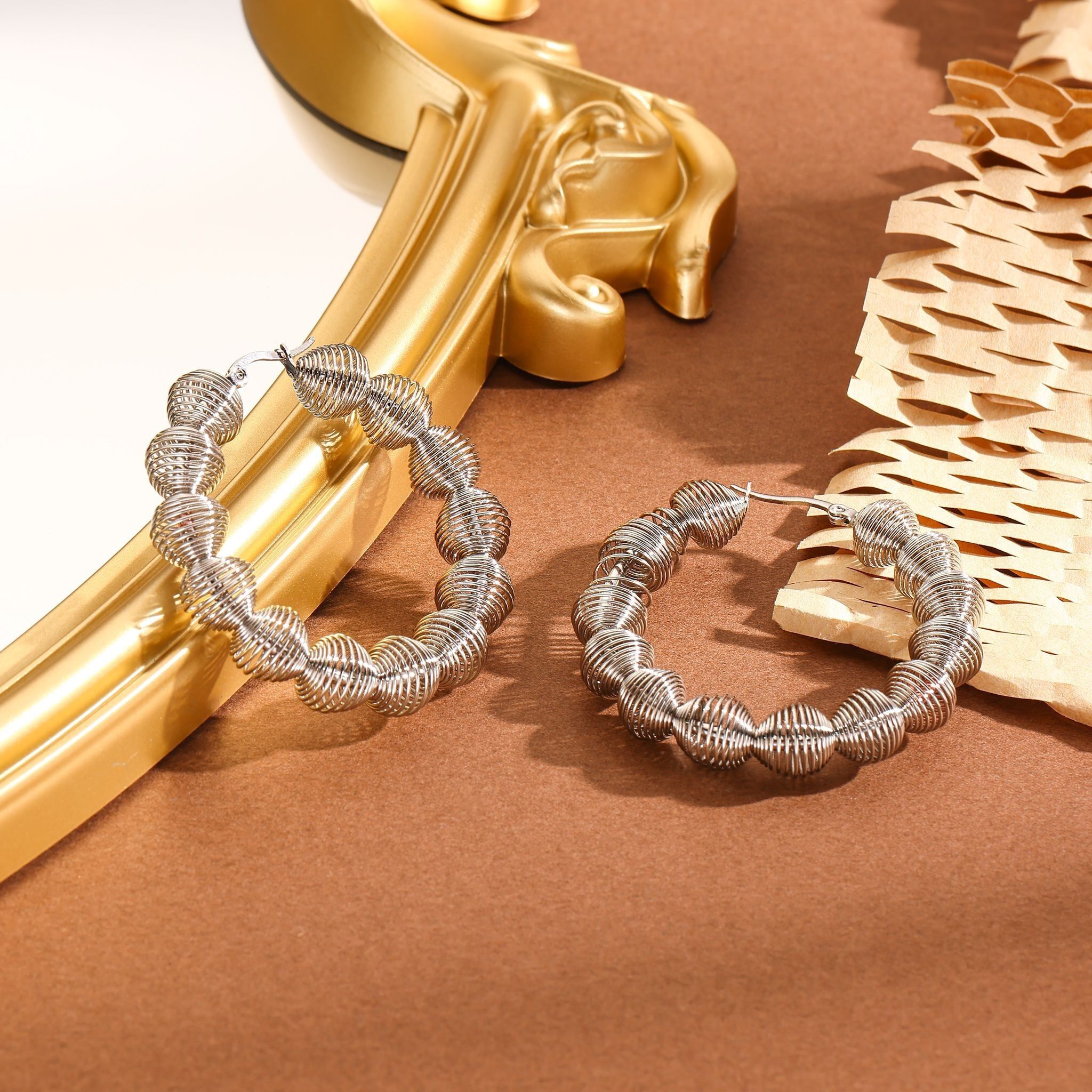 Rotoli di orecchini a cerchio in argento