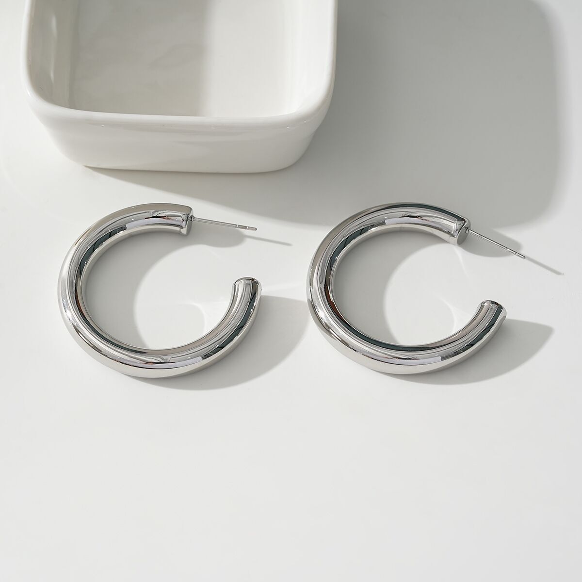 Orecchini a cerchio aperto in argento