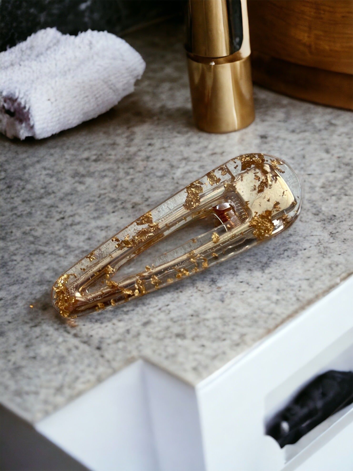 Molletta in resina dorata