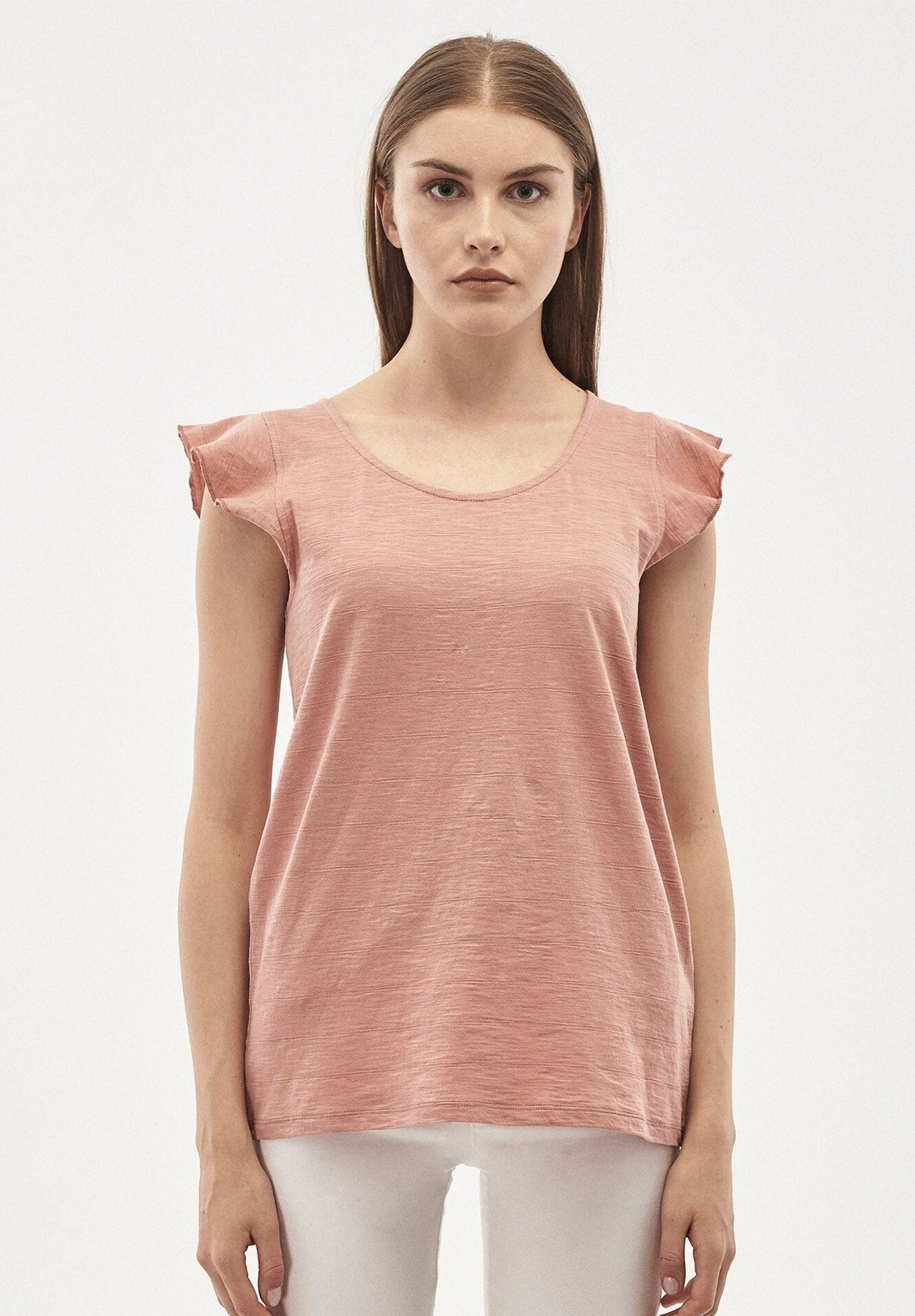 Top realizzato in cotone biologico con maniche a balze
