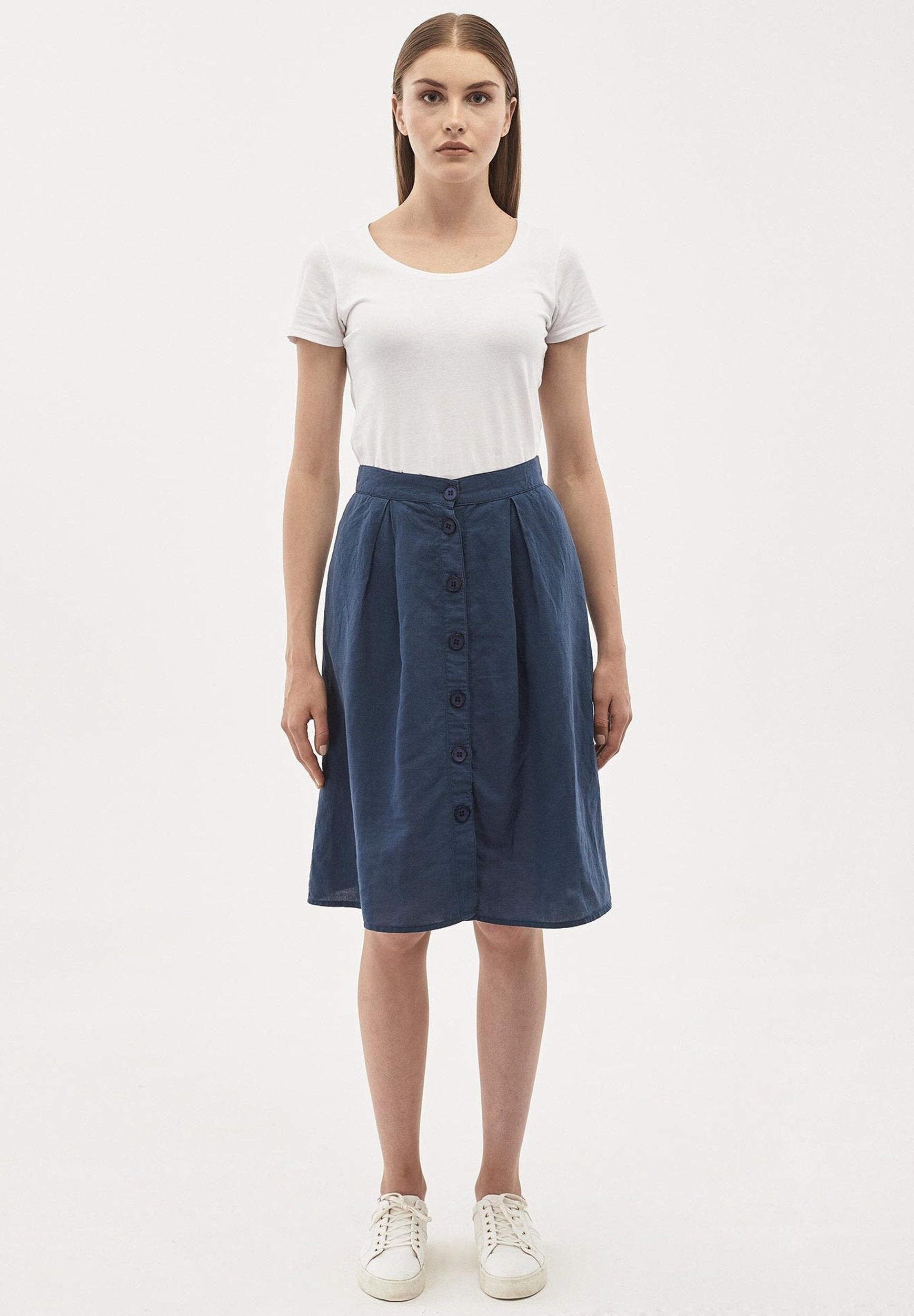 Gonna realizzata in misto lino con tasche laterali