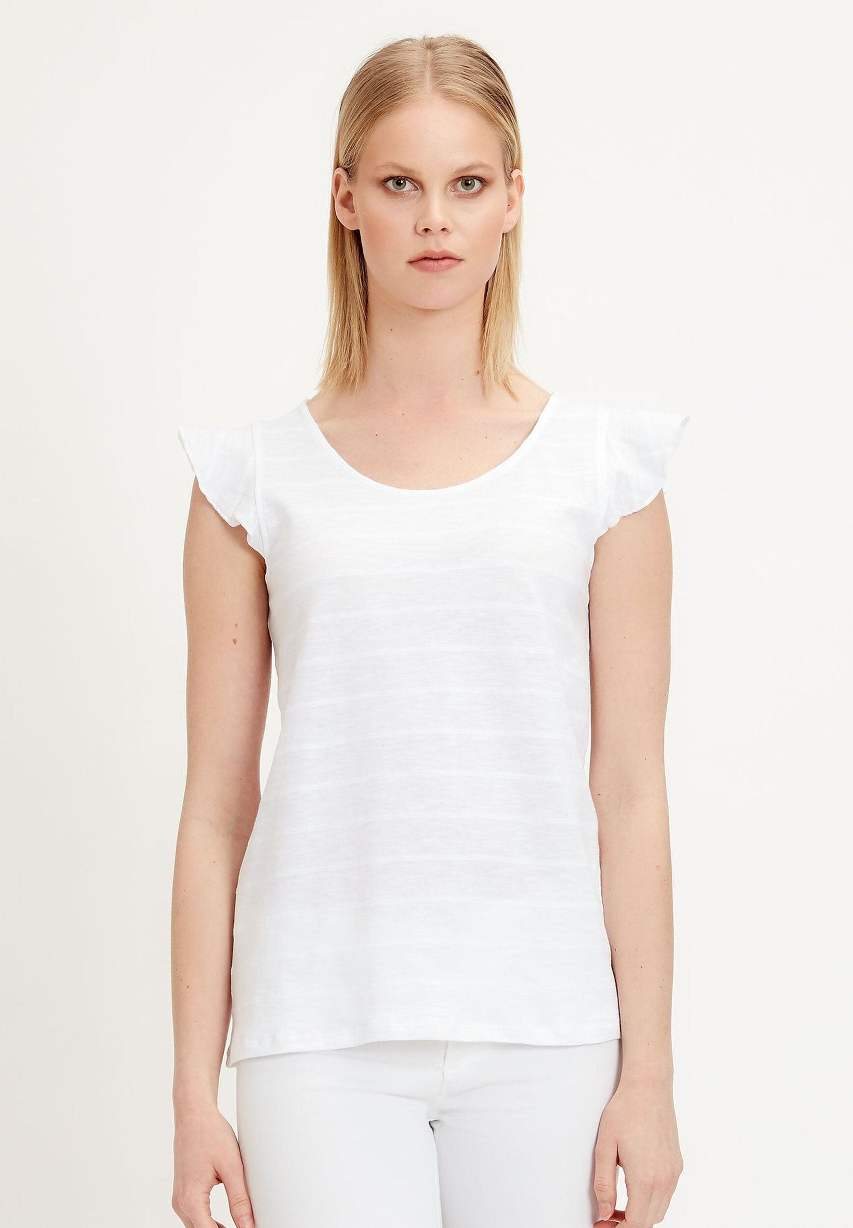 Top realizzato in cotone biologico con maniche a balze