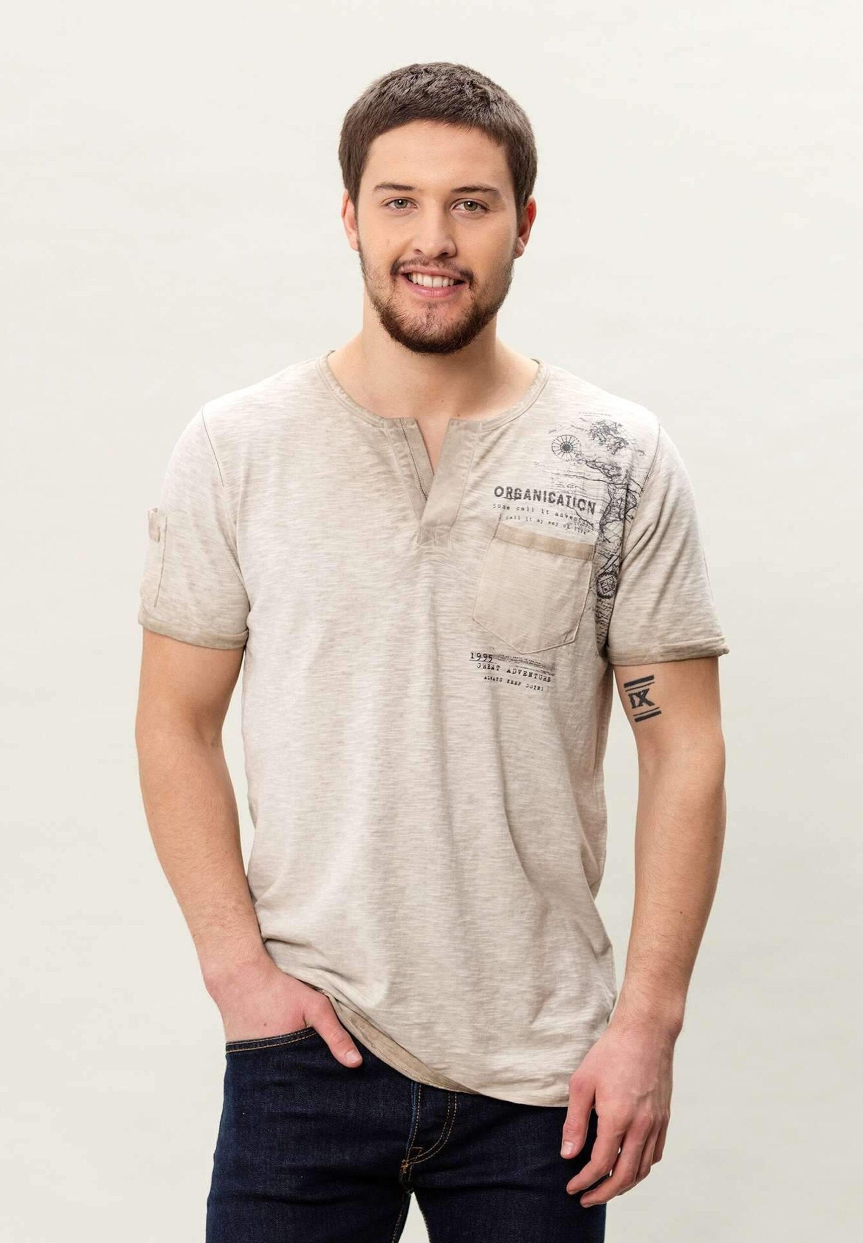 Maglia serafino in cotone biologico con taschino sul petto