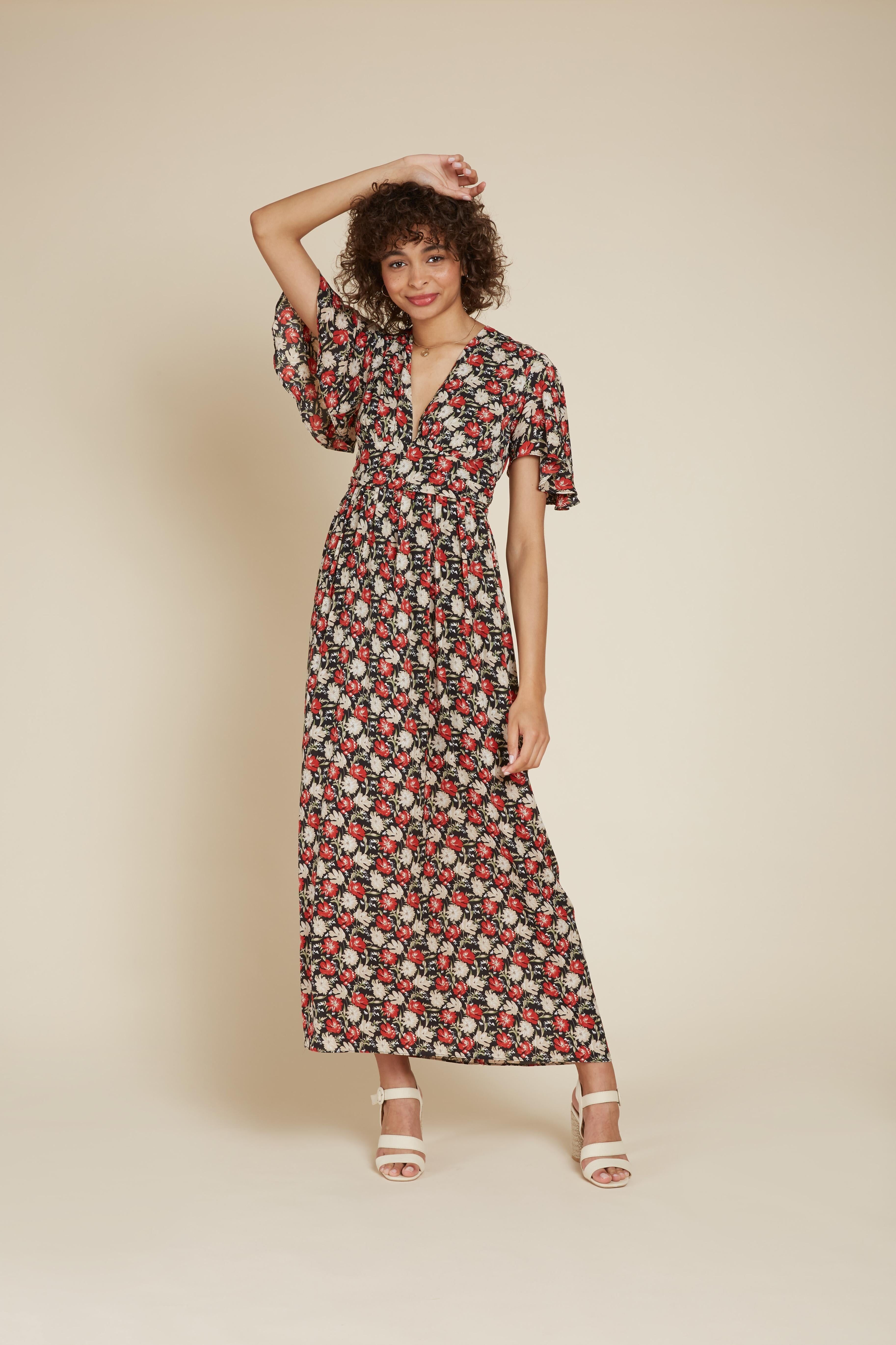 VICTORIA - Abito lungo con fantasie floreali e schiena scoperta