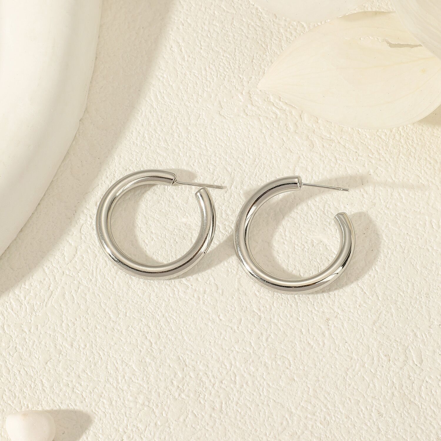 Orecchini a cerchio ondulato in argento