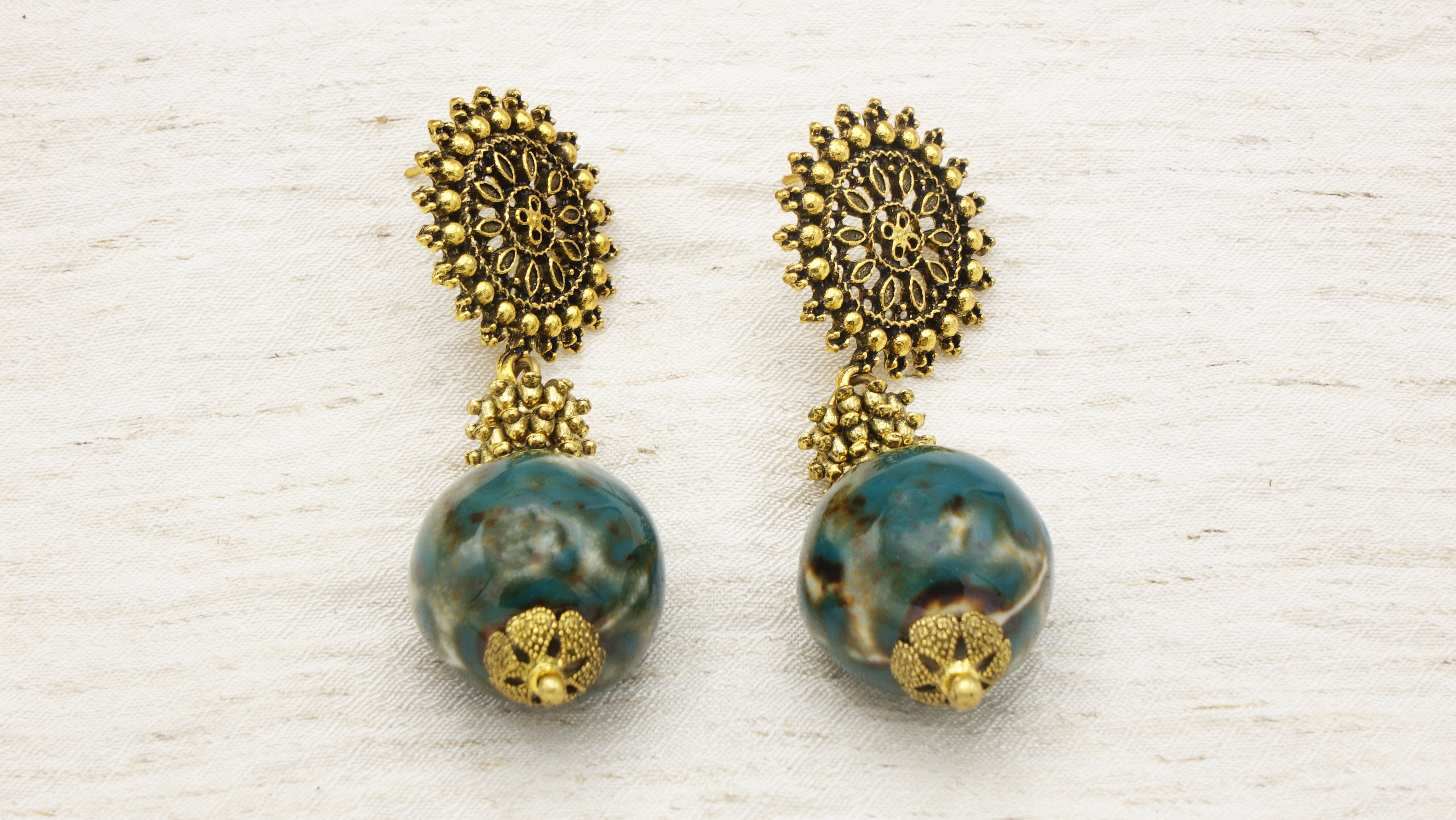 Orecchino in ceramica a raggi di sole