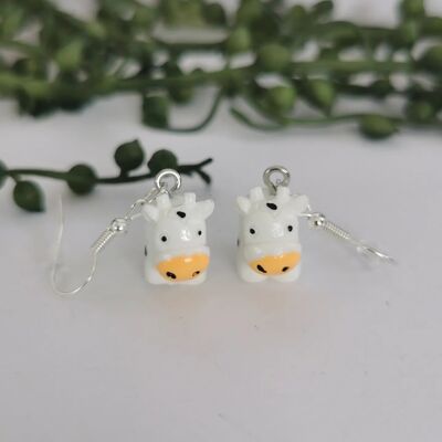 Orecchini a forma di mucca carini in bianco e nero