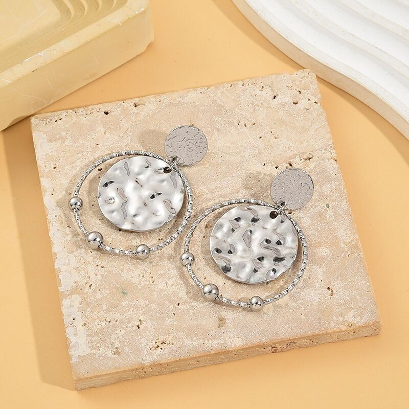 Orecchini pendenti in argento martellato