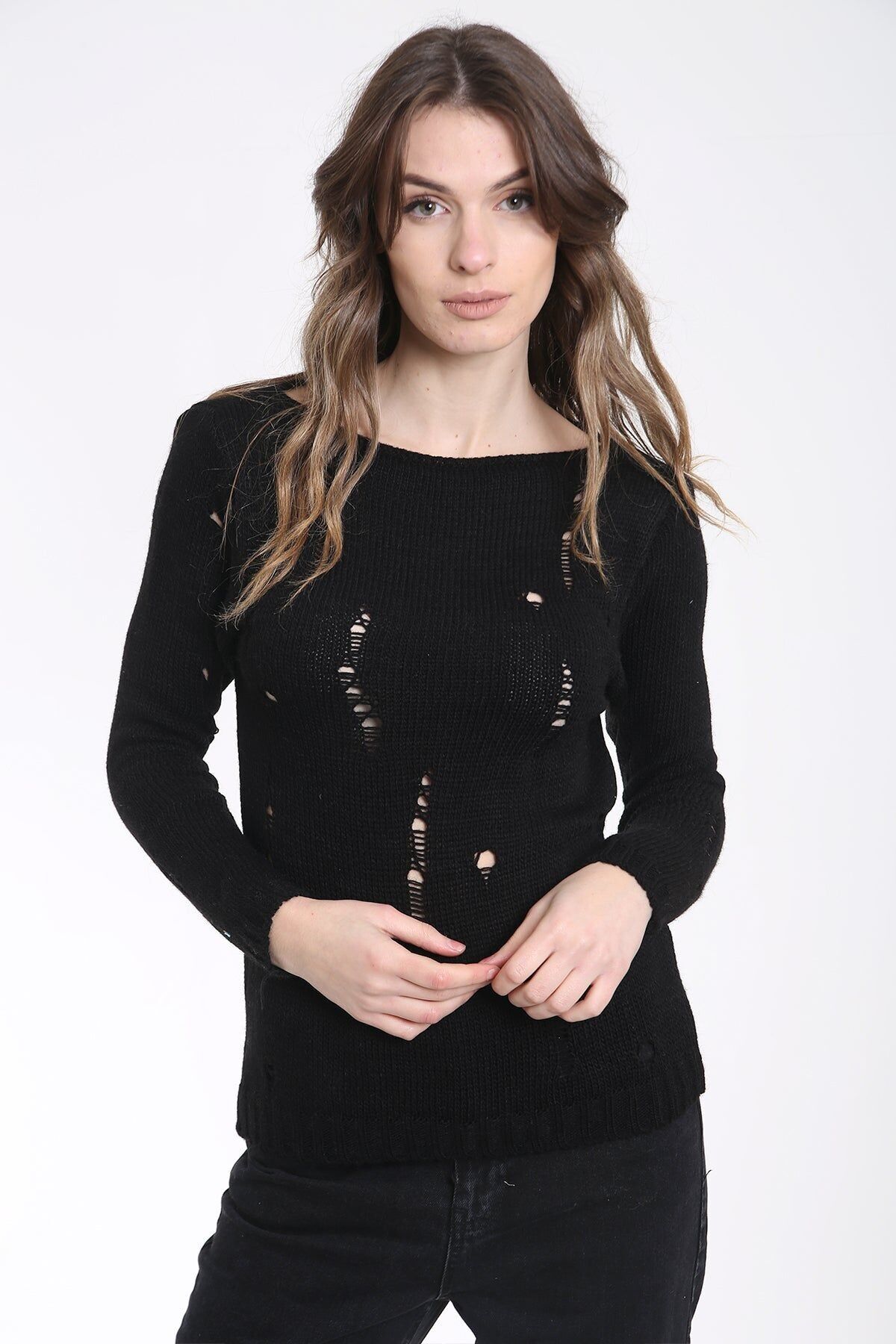 Maglione lavorato a maglia rovinato