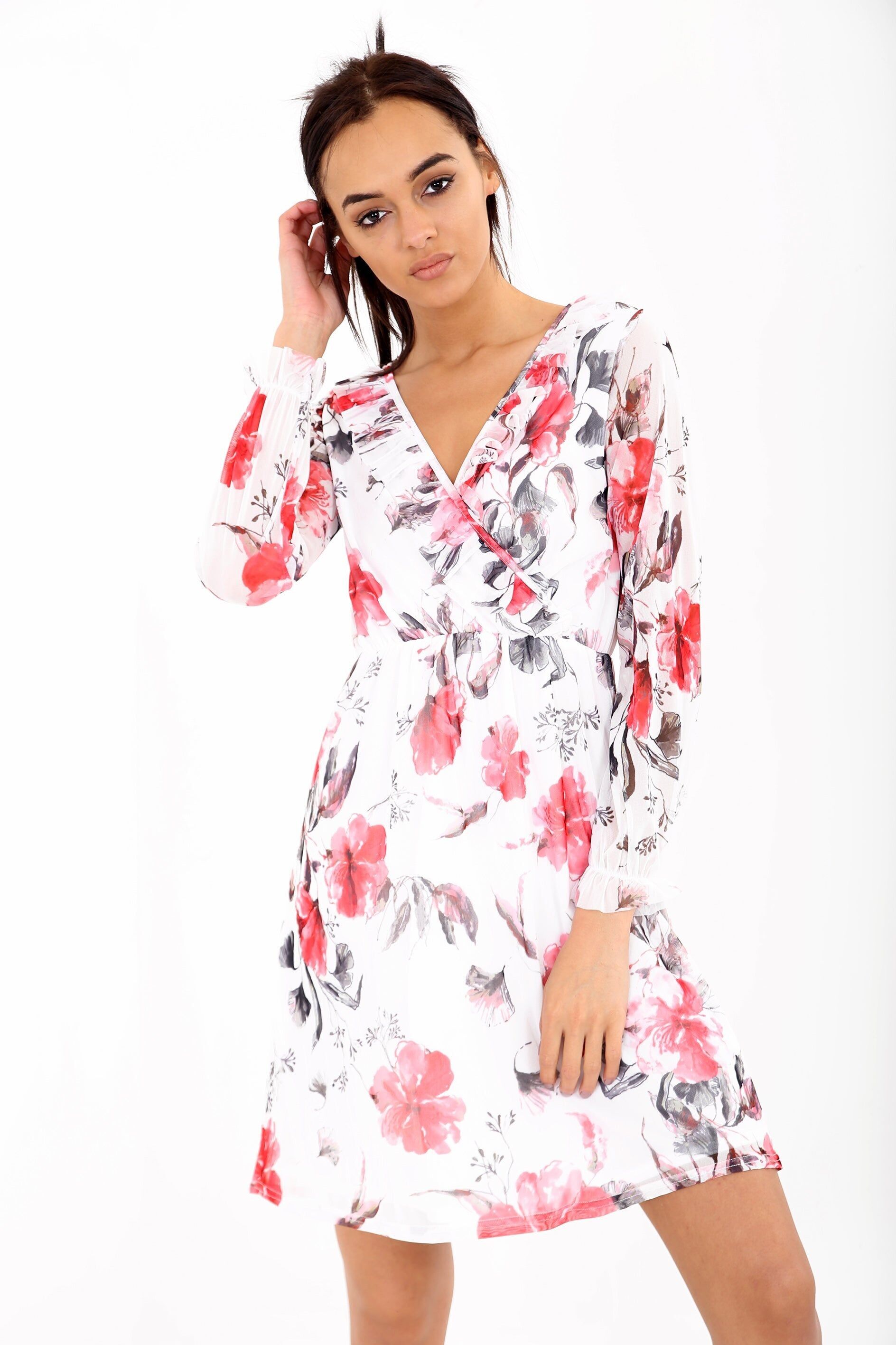 Abito avvolgente con volant floreali su rete