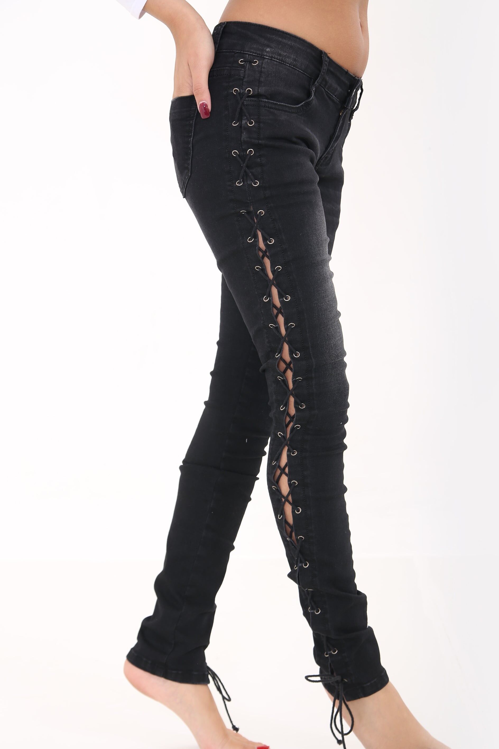 Jeans denim con allacciatura laterale e occhielli