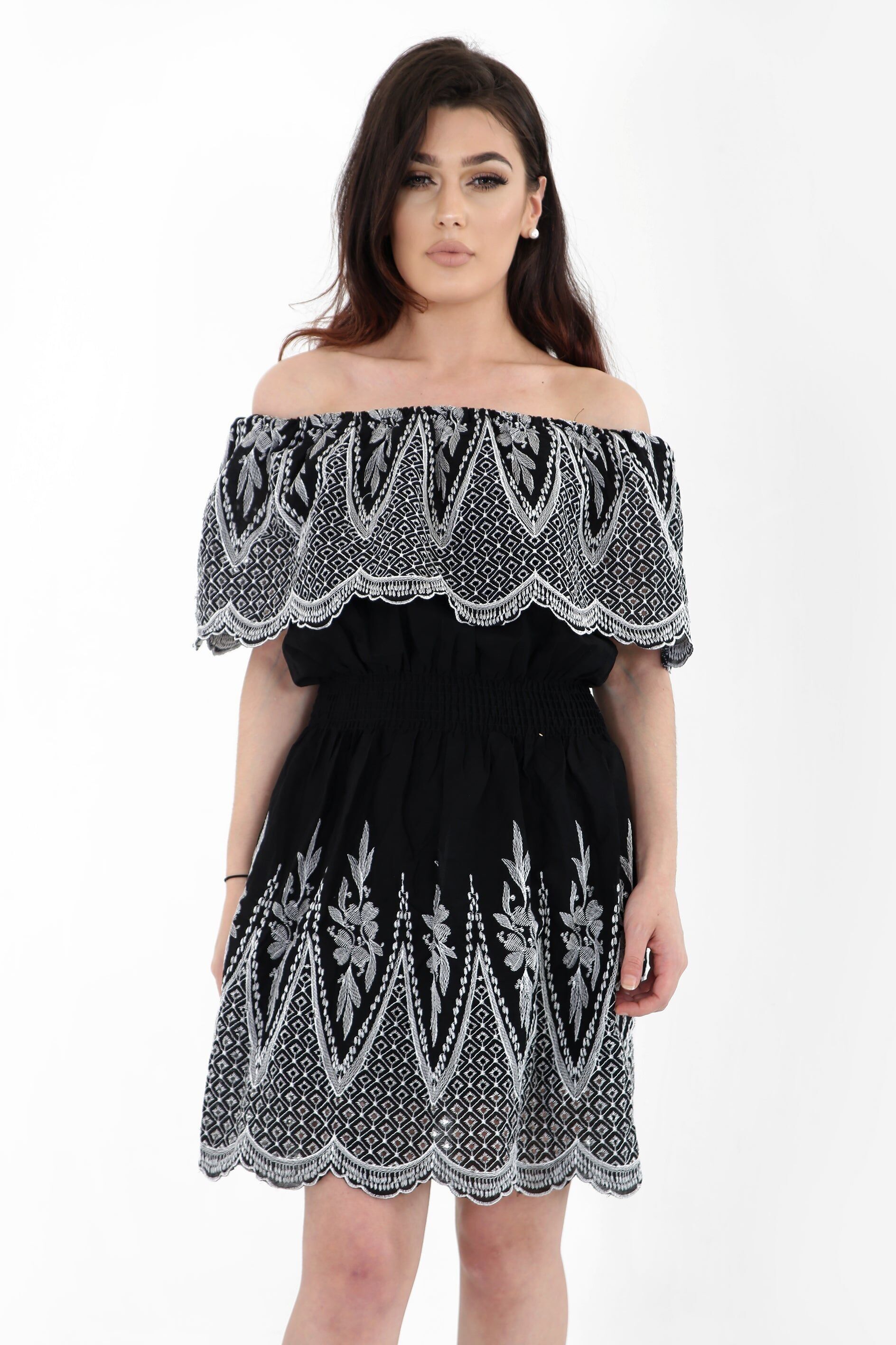 Abito Bardot con volant ricamato e orlo foderato